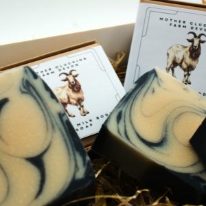 **Beach Goat: Goat’s Milk Soap with Coconut & Activated Charcoal** Escape to paradise with *Beach Goat*, infused with the tropical scent of coconut and the detoxifying power of activated charcoal. This nourishing bar cleanses, hydrates, and balances your skin, leaving it smooth and refreshed. Handmade with love on our family farm!